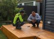 Builder and homeowner discussing an on-site repair assessment in Christchurch